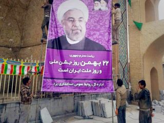 افراطیون تحمل عکس روحانی را هم ندارند