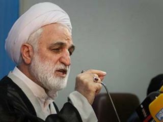 اژه‌ای دفاع از عمل دست دادن با اوباما را جاسوسی دانست