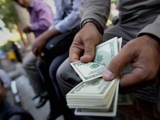 بازداشت جاعل اسکناس‌های ۱۰۰ دلاری در قم