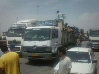 اعتصاب کامیون‌داران در بندرعباس؛ مسئولان می‌گویند رسیدگی می‌کنیم