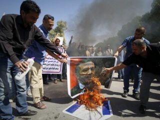 آتش زدن عکس اردوغان در بصره+تصاویر