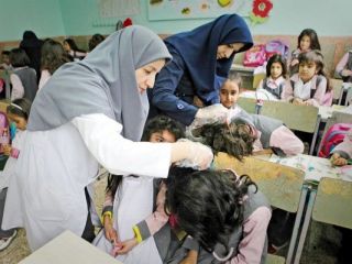 قیچی کردن موی ۹ دانش آموز دختر در فسا