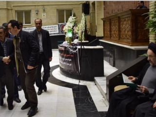 خاتمی و احمدی‌نژاد در مراسم بزرگداشت یک سردار سپاه