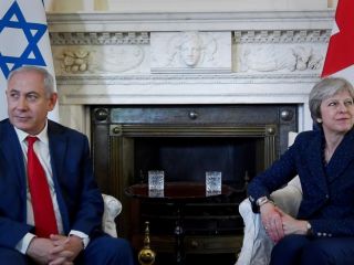 ترزا می: تا زمانی که ایران به برجام پایبند باشد ما هم به آن متعهدیم