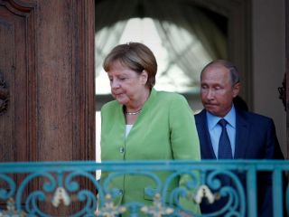 مرکل: آلمان به برجام پایبند اما نگران برنامه موشکی ایران است