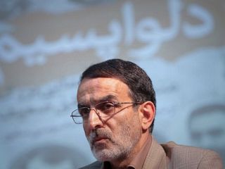 کریمی قدوسی برای استعفای ظریف در مجلس شیرینی پخش کرد