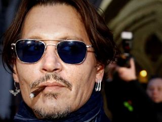 شکایت جانی دپ از روزنامه «سان» که وی را به عنوان «فردی که همسرش را کتک می زند » معرفی کرده