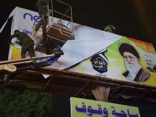 به دستور نخست وزیر عراق ، تصاویر خامنه ای , خمینی و قاسم سلیمانی در بغداد پایین کشیده شد