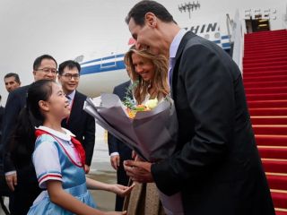 (تصاویر) بشار اسد و همسرش در افتتاحیه بازی‌های آسیایی