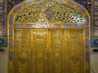 تصاویری از درب طلای جدید حرم امام هشتم شیعیان