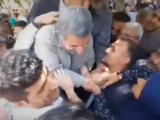 یک زن در بازار خطاب به احمدی نژاد: سری پیش مالی نبودی ، الان خیلی خوشگل تر شدی!