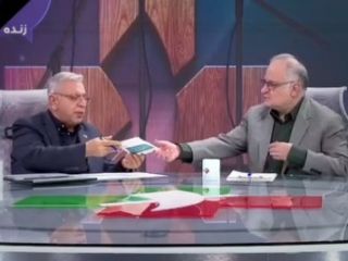 رونمایی از قرص اورانیوم هسته‌ای در برنامه زنده صدا و سیما