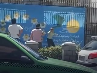اقدام به خودسوزی یک سرهنگ بازنشسته نیروی انتظامی روبروی مجلس شورای اسلامی