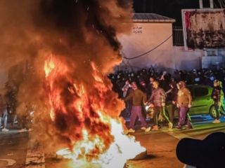 اعتراضات خونین دی ماه مردم ایران در قاب تصاویر