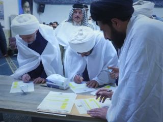 امضای فرم داوطلبی کفن‌پوشان کتائب حزب‌الله برای «عملیات انتحاری» در راه جمهوری اسلامی